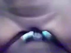 A flat-titted Indian girl is perched atop my pecker.